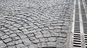 Driveway Drainage Grate Replacement: Tips in Maintaining Your Driveway